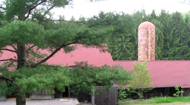 a barn with a silo